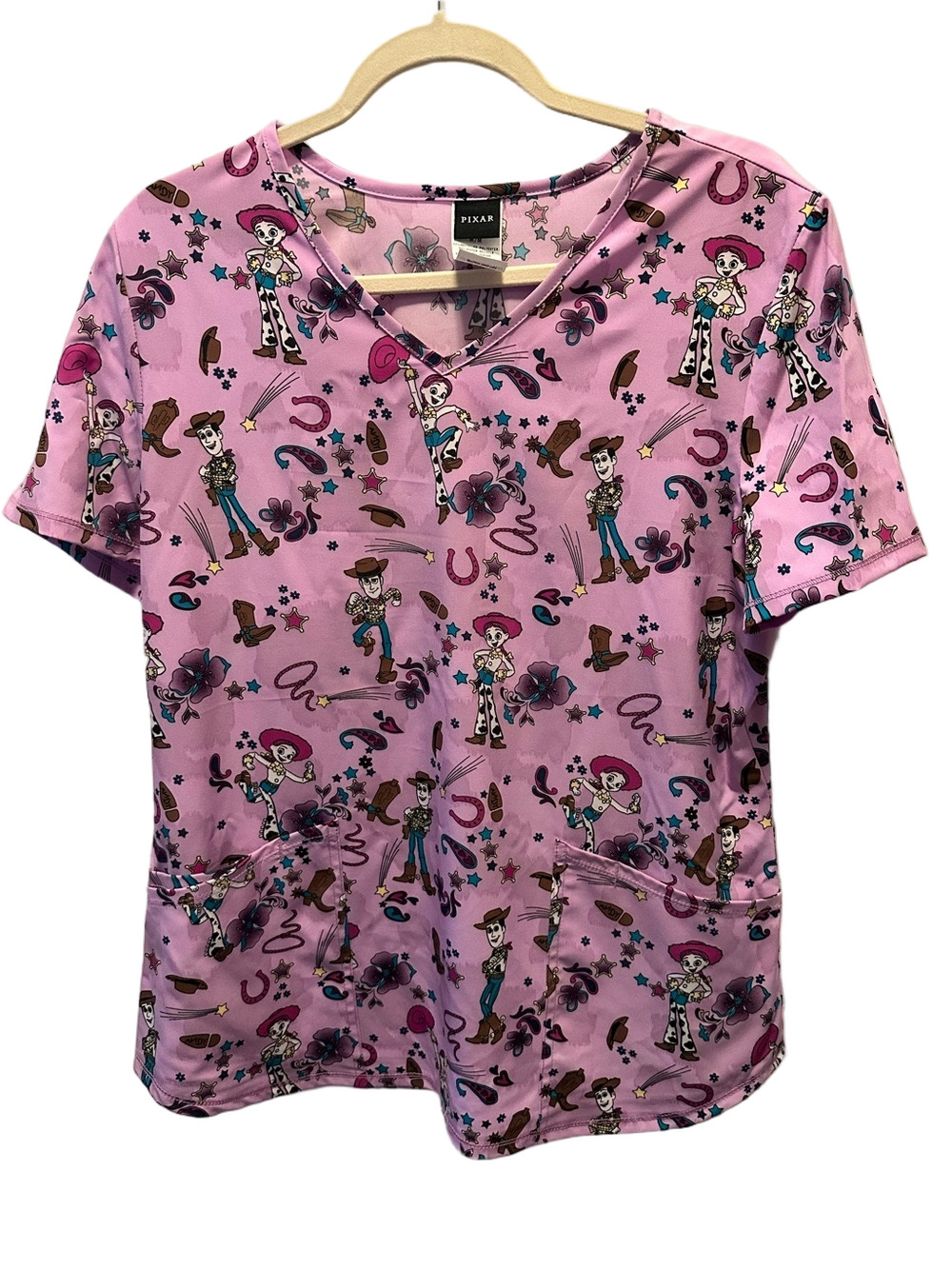 Pixar Toy Story Jessie Woody Pink Scrub Top V Neck Medical Uniform NWT